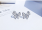 Platina Diamond Bow Stud Earrings 0.10ct VERSUS Aangepaste Duidelijkheid 4.5gram